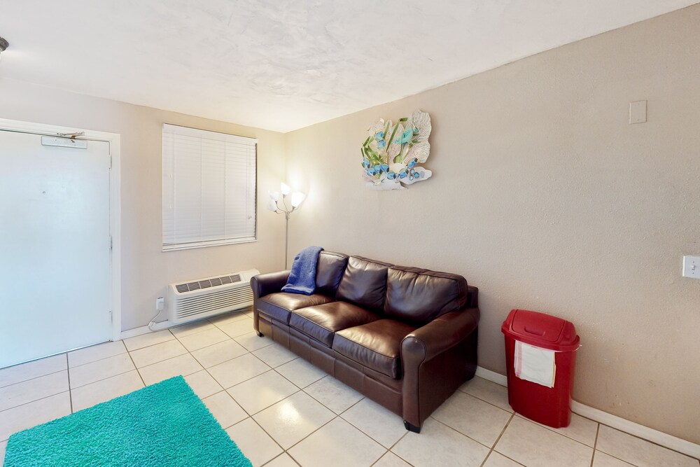 Condo w/ furnished balcony, shared pool, hot tub, game room, gym, & beach access