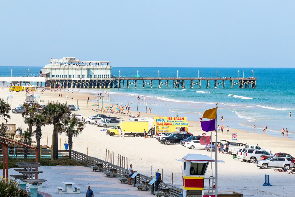 Condo w/ furnished balcony, shared pool, hot tub, game room, gym, & beach access