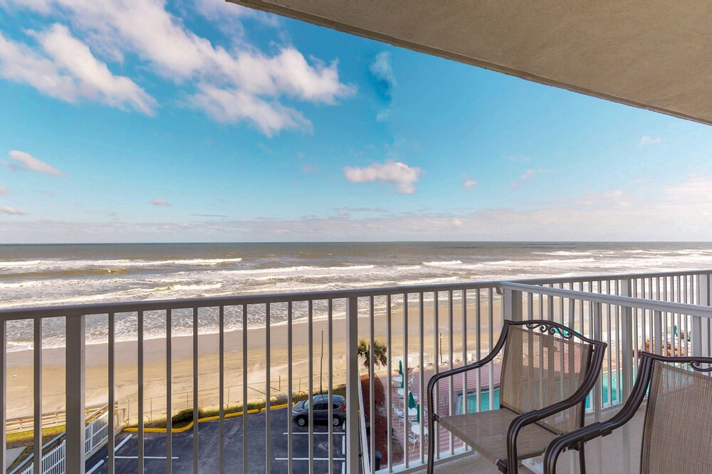 Condo w/ furnished balcony, shared pool, hot tub, game room, gym, & beach access
