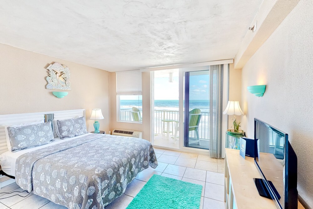 Condo w/ furnished balcony, shared pool, hot tub, game room, gym, & beach access