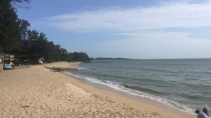 On the beach, sun-loungers, beach towels