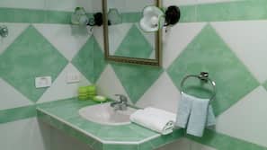 Shower, free toiletries, hair dryer, towels