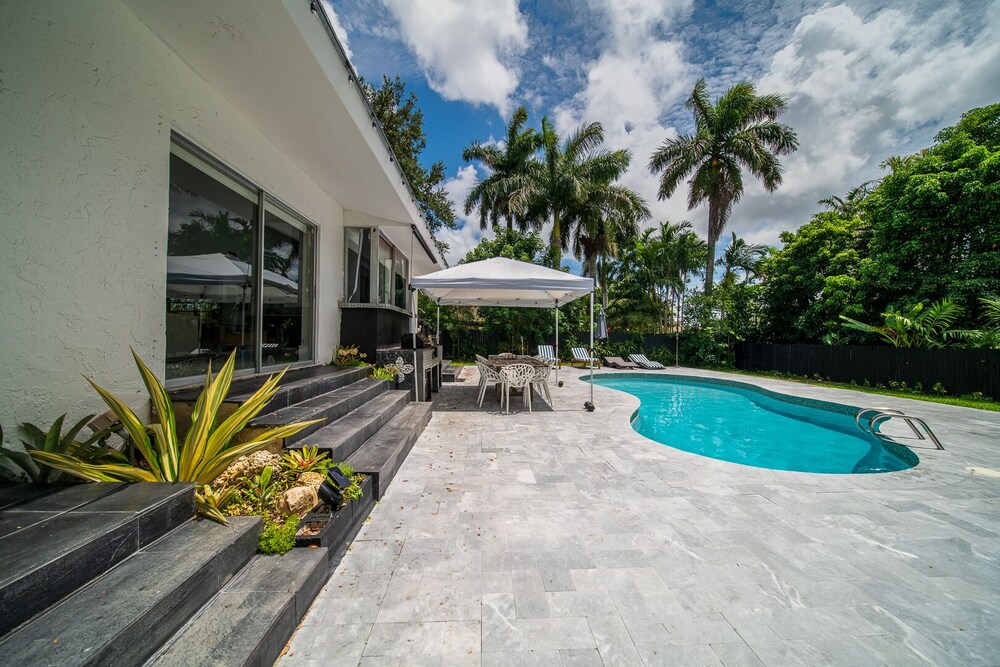 Art Nango tropical pool side retreat.