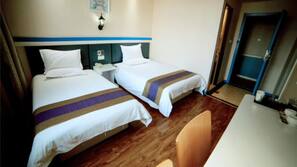 Desk, blackout curtains, free WiFi, linens