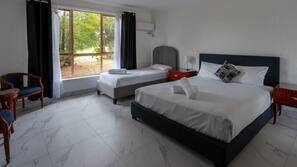 Blackout curtains, iron/ironing board, free WiFi, linens