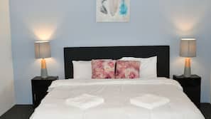 Blackout curtains, iron/ironing board, free WiFi, linens