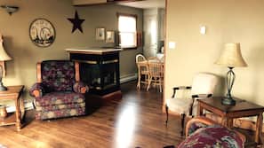 TV, fireplace, books