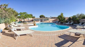 Outdoor pool, sun loungers