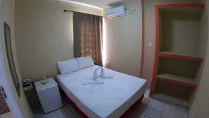 Frigobar, cortinas blackout, Wi-Fi de cortesia, roupa de cama