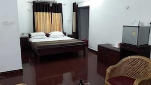 Blackout curtains, iron/ironing board, free WiFi, linens