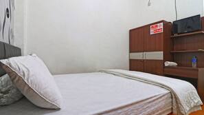 Roupas de cama premium, escrivaninha, Wi-Fi de cortesia
