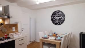 Fridge, oven, hob, coffee/tea maker
