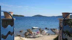 On the beach, sun-loungers, beach towels