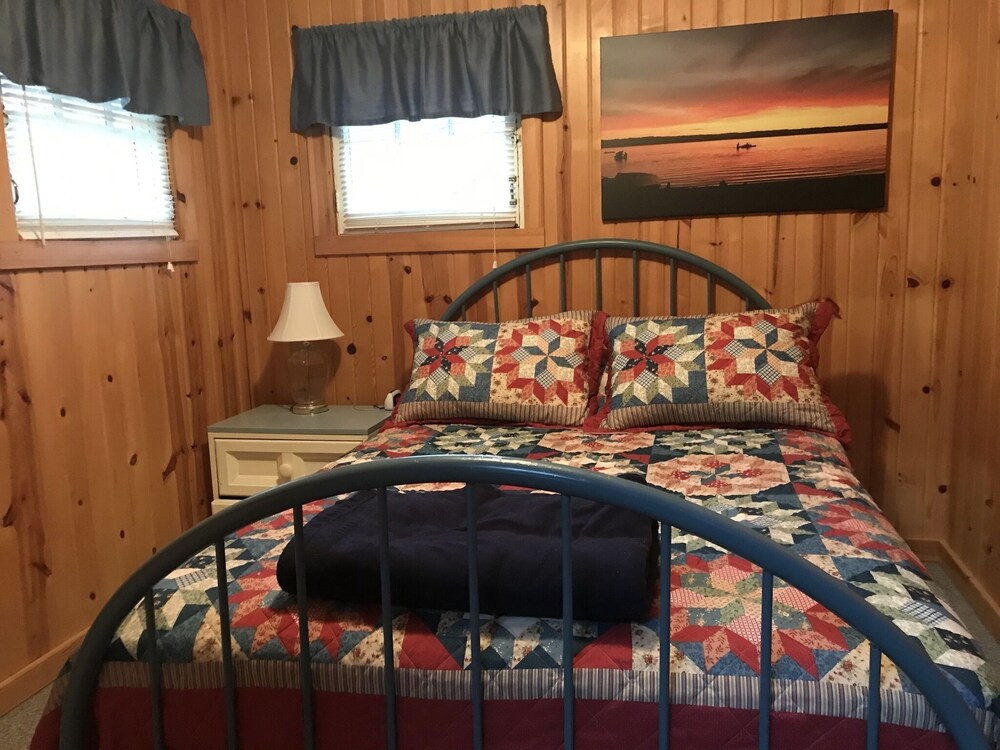 Get away at this quaint cottage tucked behind a beautiful fern bed