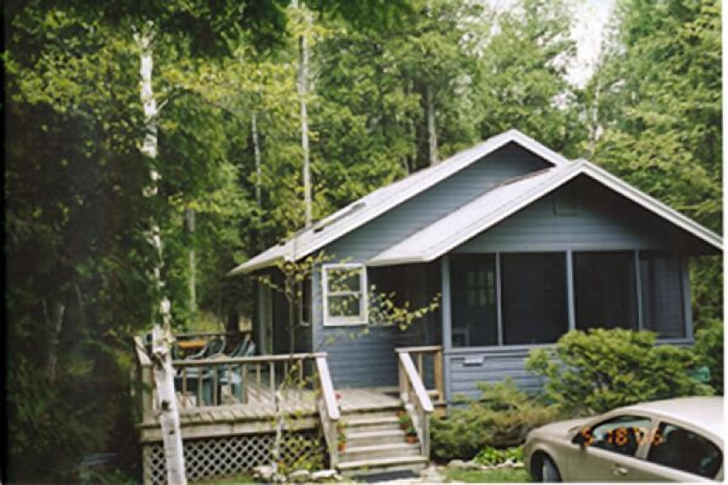 Comfort and Beauty Tucked Between the Trees in Baileys Harbor, United States