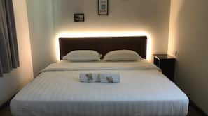 Desk, iron/ironing board, linens