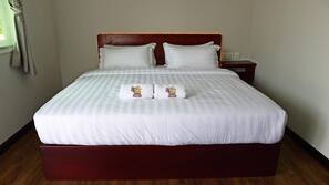 Desk, iron/ironing board, linens