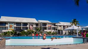 Outdoor pool, pool umbrellas, sun loungers
