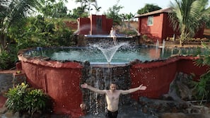 3 outdoor pools, open 8:00 AM to 6:00 PM, pool umbrellas, pool loungers