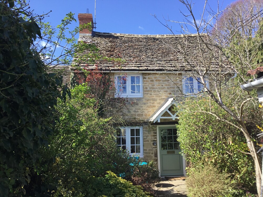 Picture Postcard Cotswold Cottage In The Attractive Market Town Of