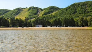 Private beach nearby, sun-loungers, beach towels, beach volleyball