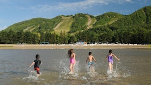 Private beach nearby, sun-loungers, beach towels, beach volleyball