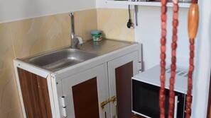 Microwave, coffee/tea maker, electric kettle, toaster