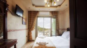 Premium bedding, blackout drapes, iron/ironing board, free WiFi