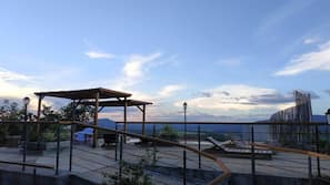 Outdoor pool, open 8:00 AM to 10:00 PM, pool umbrellas, sun loungers