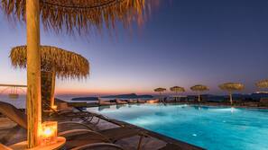 Seasonal outdoor pool, open 8:00 AM to 10:00 PM, pool umbrellas