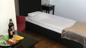 Mörkläggningsgardiner, strykjärn/strykbräda och gratis barnsängar