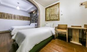 Premium Twin Room, Multiple Beds | Individually decorated, individually furnished, desk, blackout drapes