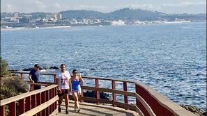 On the beach, sun-loungers, beach umbrellas, 3 beach bars