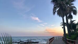 On the beach, sun-loungers, beach umbrellas, 3 beach bars