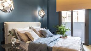 Premium bedding, down comforters, pillowtop beds, in-room safe