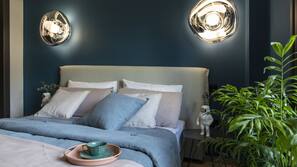 Premium bedding, down comforters, pillowtop beds, in-room safe