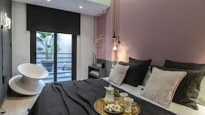 Premium bedding, down comforters, pillowtop beds, in-room safe