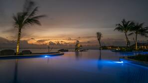 Outdoor pool, free pool cabanas, pool umbrellas