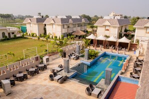 Outdoor pool, open 9:00 AM to 6:00 PM, pool umbrellas, sun loungers