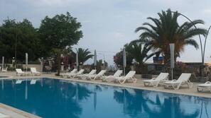 Outdoor pool, pool umbrellas, pool loungers