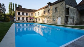 Seasonal outdoor pool, pool loungers