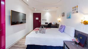 Premium bedding, down comforters, in-room safe, individually decorated