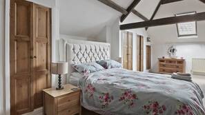 Premium bedding, blackout curtains, iron/ironing board, free WiFi