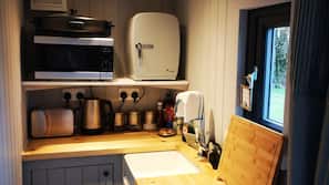 Microwave, electric kettle, cookware/dishes/utensils
