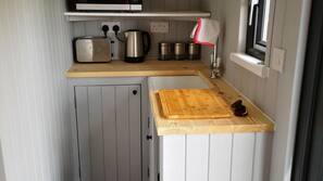 Microwave, electric kettle, cookware/dishes/utensils