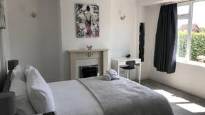 Premium bedding, iron/ironing board, free WiFi, linens
