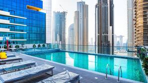 Outdoor pool, open 9:00 AM to 8:00 PM, pool loungers