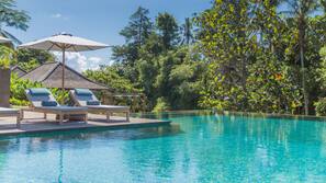 Outdoor pool, open 7:00 AM to 7:00 PM, pool umbrellas, sun loungers