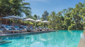 Outdoor pool, open 7:00 AM to 7:00 PM, pool umbrellas, sun loungers