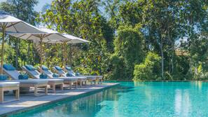 Outdoor pool, open 7:00 AM to 7:00 PM, pool umbrellas, sun loungers
